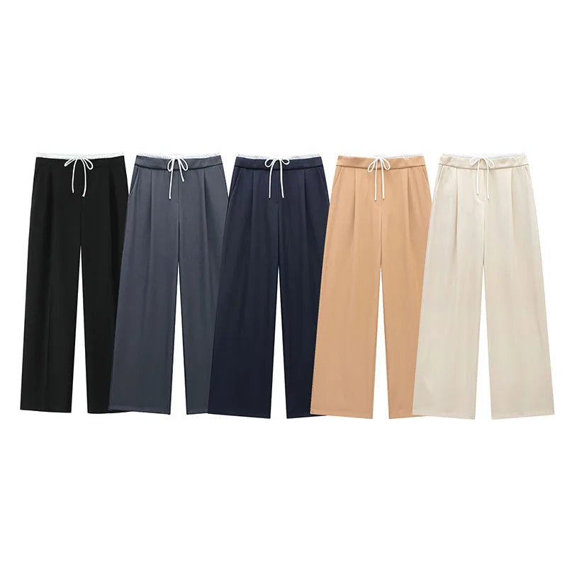 Pantalon tailleur femme noir, coupe droite et élégante pour un look formel.