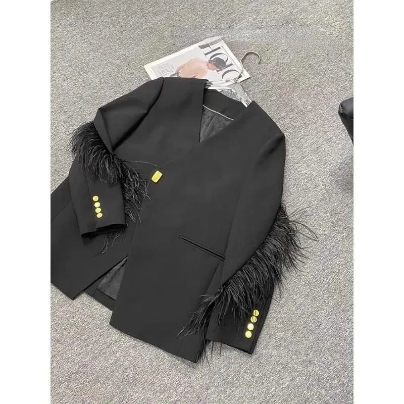 Blazer long avec détails plumes