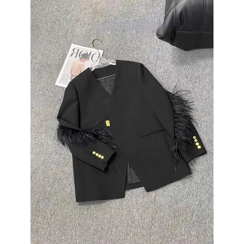 Blazer long avec détails plumes