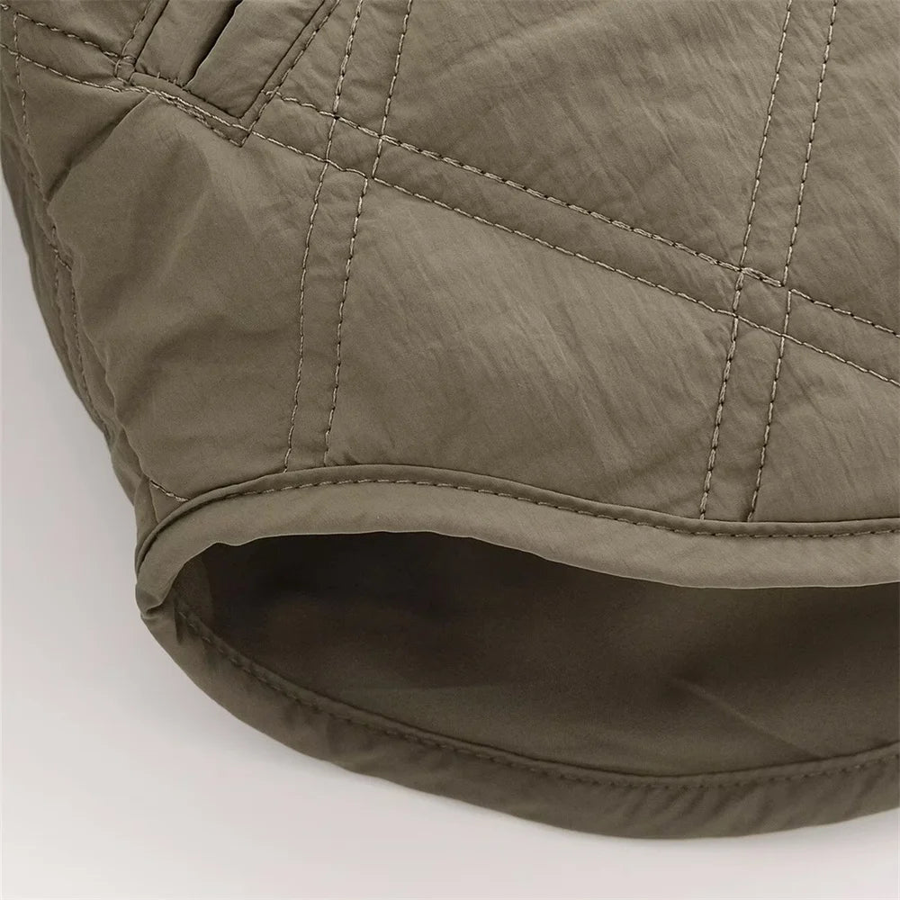 Veste matelassée portée avec une tenue casual